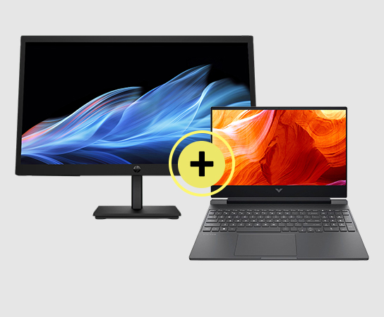 Fotograf&iacute;a de un combo con un monitor y una laptop.